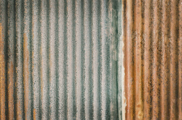 Old zinc wall texture background, rusty on galvanized metal panel sheeting.