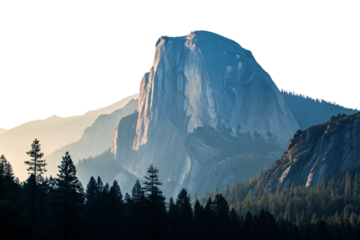 Half Dome granite cliff formation in Yosemite with surrounding forest and golden sunset light, isolated on a transparent background