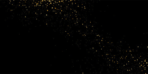 Gold glitter texture on a black background. Holiday background. Golden explosion of confetti. Golden grainy abstract texture on a black background. Design element