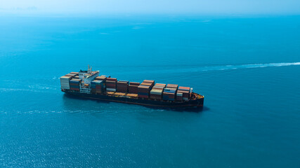 Aerial view of the freight shipping transport system cargo ship container. international...