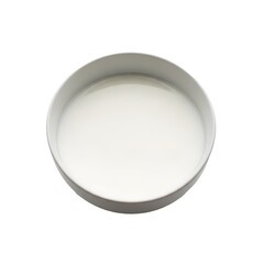 Bowl of milk on black background