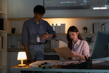 Team collaboration in a dimly lit office space