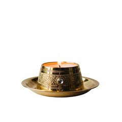 Golden candle flame on dark background