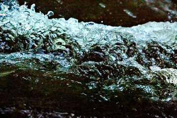 Churning turbulence in a small rapids of the Sugar River.