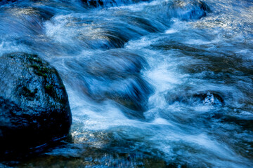 Blurred flow of the Sugar River in Newport,New Hampshire.