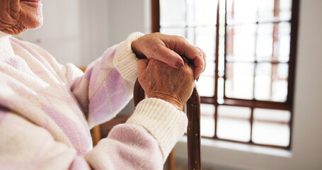 Senior woman, hands and thinking with cane for healthcare or support in retirement home. Closeup,...