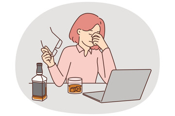 Businesswoman drinks whiskey sitting near laptop and feeling stressed after company goes bankrupt