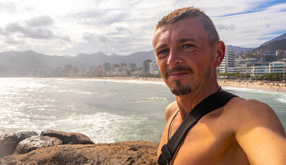 Handsome Tourist on Ipanema Beach Rio de Janeiro Brazil.