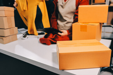 Portrait of Starting small businesses SME owners, two Asian woman check online orders Selling...