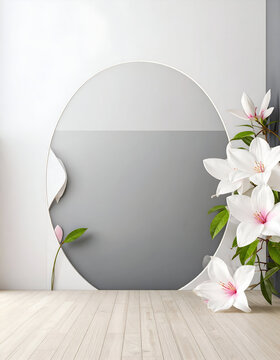 A minimalist interior featuring a mirror and elegant white flowers against a gray wall.