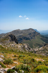 Mountains surrounding Siniscola in Sardinia, Italy, under blue s