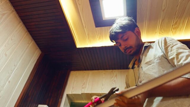 False Ceiling Installation Active inside Renovated Space