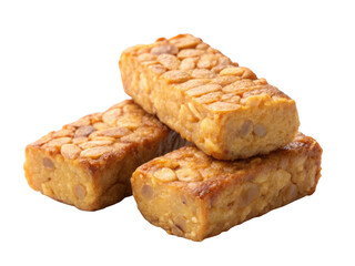 Three golden brown pieces of tempeh stacked on top of each other isolated on transparent background