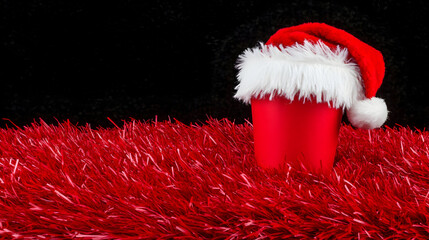 Blank paper coffee cup mockup with Santa hat