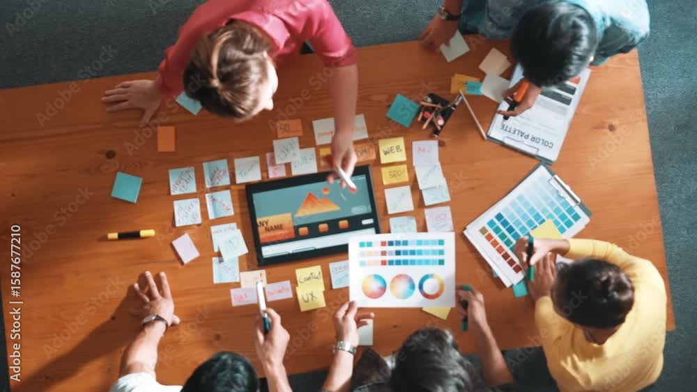 Poster top view of skilled business people working together to design web design. aerial view of designer b