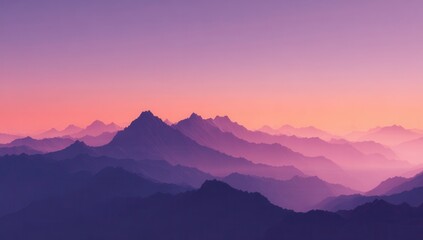 Misty mountain range at sunset