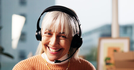 Mature, happy woman and consultant with headset for online communication or advice in office....