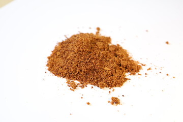 Scattered piles of brown sugar