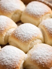 Soft, pillowy yeast rolls dusted with powdered sugar