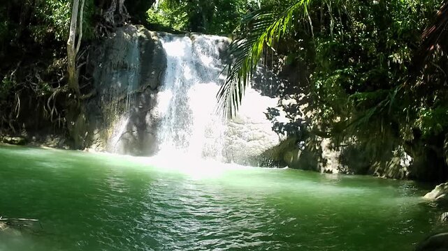 A video of a very beautiful waterfall. One of the waterfalls located in the middle of the forest on Biak Island, Papua, Indonesia.