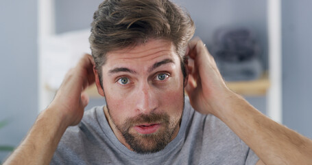 Portrait, man and checking hairline, concerned or worry for hair loss in house, self care and...