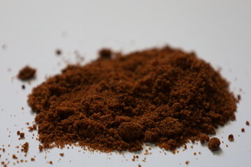 Scattered piles of brown sugar