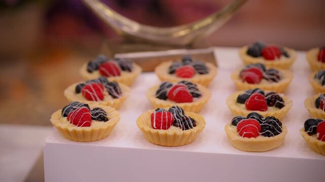 Sweets desserts at the banquet, sponge cakes, shortbread tarts. move camera footage