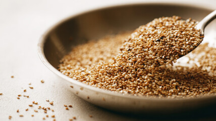 Toasting sesame seeds in dry pan, aromatic feel