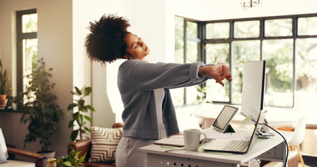 Remote work, tired and african woman stretching by technology and desk in home office. Start, ready...