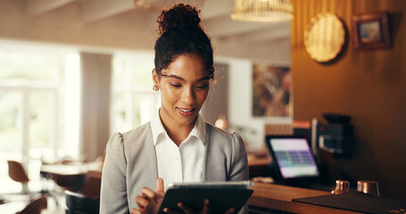 Typing, tablet and business woman in airport lounge for conference, travel and email confirmation....