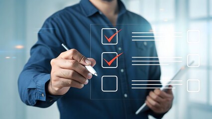 Man marking checklist on digital screen blue shirt
