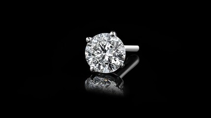 Gleaming solitaire diamond stud earring on black background