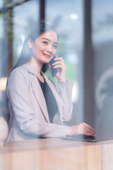 asian freelance people Beautiful business female talking making using casual working with laptop...