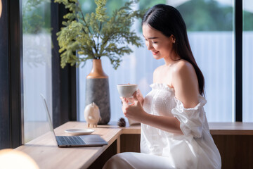 Portrait of beautiful happy Smiling  of hands Holding cup mug of Hot coffee latte wits business...