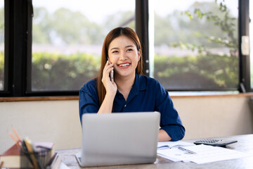 Woman, phone and laptop on talk for remote work with notebook in communication, phone call or...