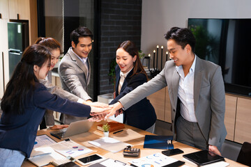 business people with hand stack in office for trust, synergy or positive reinforcement. Teamwork,...