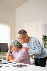 Worried Asian senior family couple reading financial documents or notification letter with bad news from bank while paying bills, retired husband and wife having money problems.