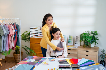 Young woman doing personal color diagnosis. An Asian woman receives a personal color diagnosis from...