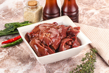 Raw uncokked chicken liver in the bowl