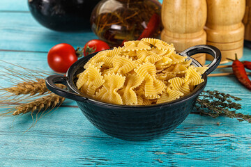 Raw dry farfalle for cooking