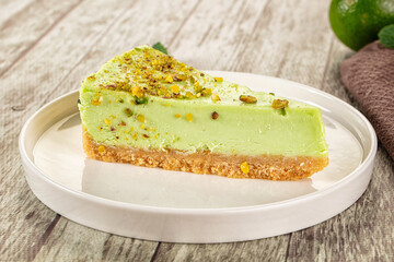 Green pistachio cheesecake served mint
