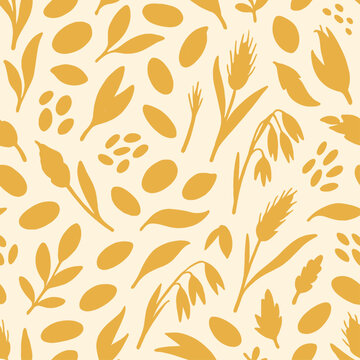Golden silhouette pattern of various plants and seeds on a cream background.