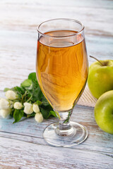 Apple yellow juice in the glass