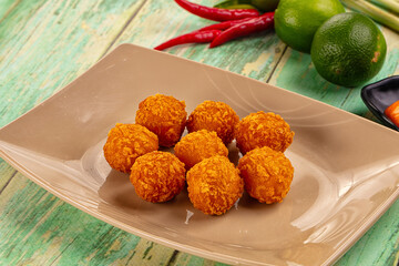 Fried crispy yellow cheese balls