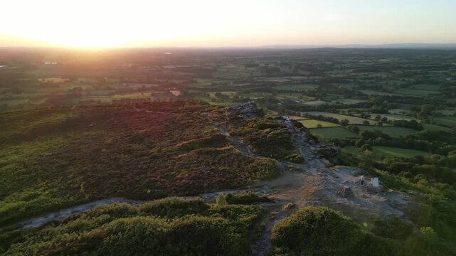 The stunning spiritual Cloud at Bosely on a full moon weekend in golden hour , Staffordshire UK - drone anti-clockwise rotate and move out