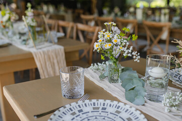 Beautiful details of the flower decorations at a wedding's reception. 