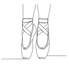Ballerina feet in pointe shoes with crossed ribbons on floor  
