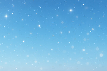 Fototapeta premium Bright blue sparkling sky background with stars and bokeh lights.