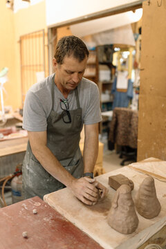 Artist in Ceramics and Pottery Studio working