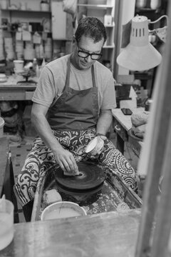 Artist in Ceramics and Pottery Studio working